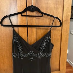 Worn out one time, perfect condition with side zipper, very sexy.